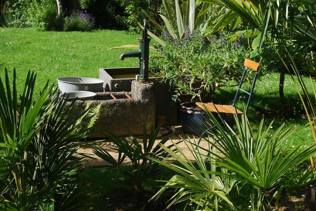 Un Jardin En Pente Douce Villa Locquenole Rom bilde
